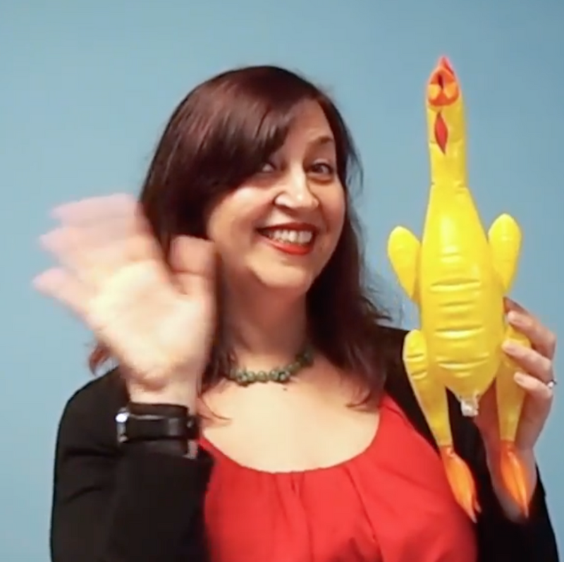 Shana with an inflatable rubber chicken