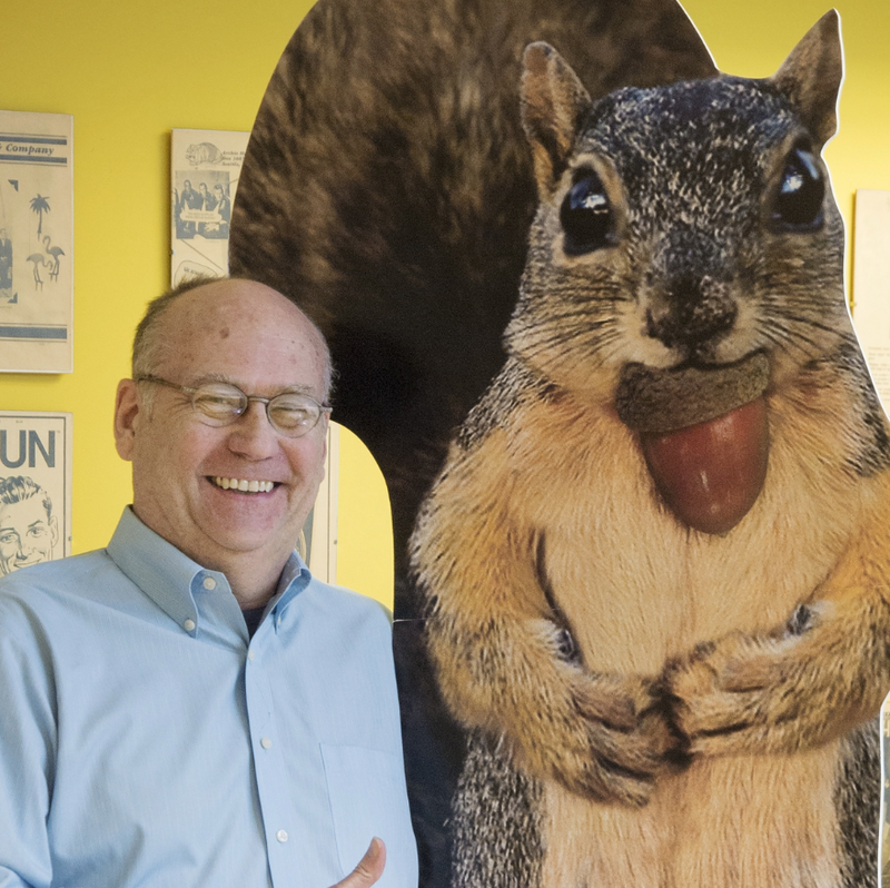 Mark Pahlow standing next to a giant squirrel