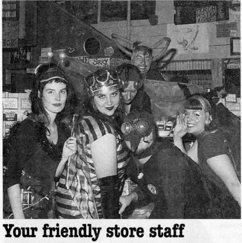 Store employees dressed in insect costumes