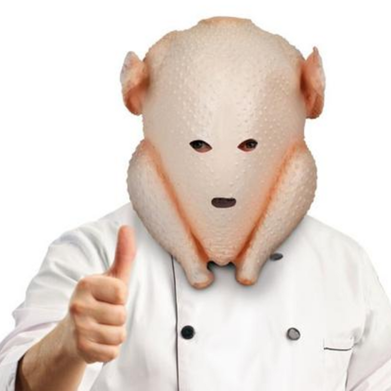 Chef in mask that looks like raw turkey