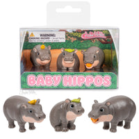 Three cute Baby Hippos figurines with tiny accessories including a pumpkin and leaves in clear packaging.