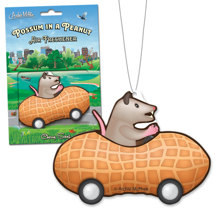 Possum in a Peanut Air Freshener product image showing cartoon possum driving peanut-shaped car, with packaging displaying city skyline background. Cherry-scented, humorous car accessory for unique odor control and whimsical decoration.