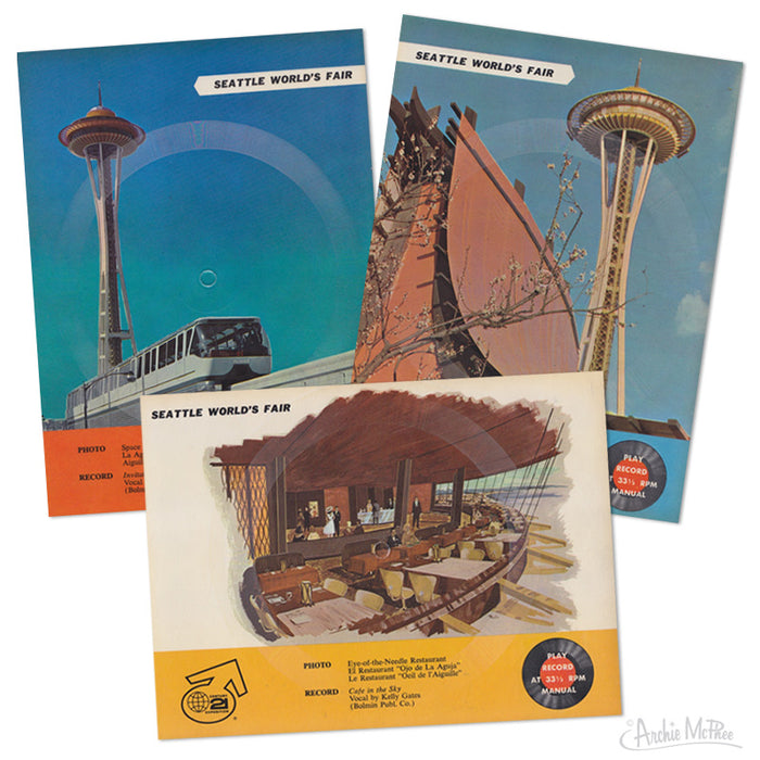 Vintage Seattle World's Fair postcards featuring Space Needle, monorail, and restaurant interior. Colorful images showcase 1962 fair attractions. Unique collectible items double as playable records with fair-inspired songs.