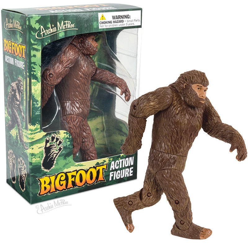 Bigfoot Action Figure with movable joints posed next to its forest-themed packaging box.