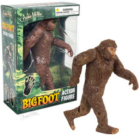 Bigfoot Action Figure with movable joints posed next to its forest-themed packaging box.