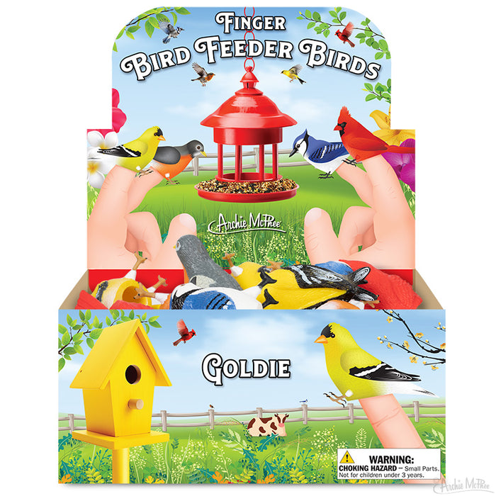 Colorful display box featuring finger bird puppets, including cardinals, goldfinches, blue jays, and robins, surrounding a red bird feeder. Hands wearing bird puppets in foreground, with yellow birdhouse and toy birds in box below.