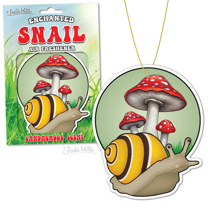 Enchanted Snail Air Freshener featuring a colorful cartoon snail with a yellow striped shell next to red spotted mushrooms on a green background, shown as both packaged product and hanging air freshener design