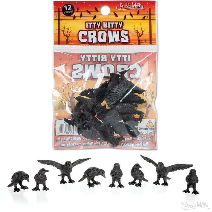 Packaged set of 12 miniature black crow figurines in various poses, with product packaging showing sunset scene and warning label, displayed against white background