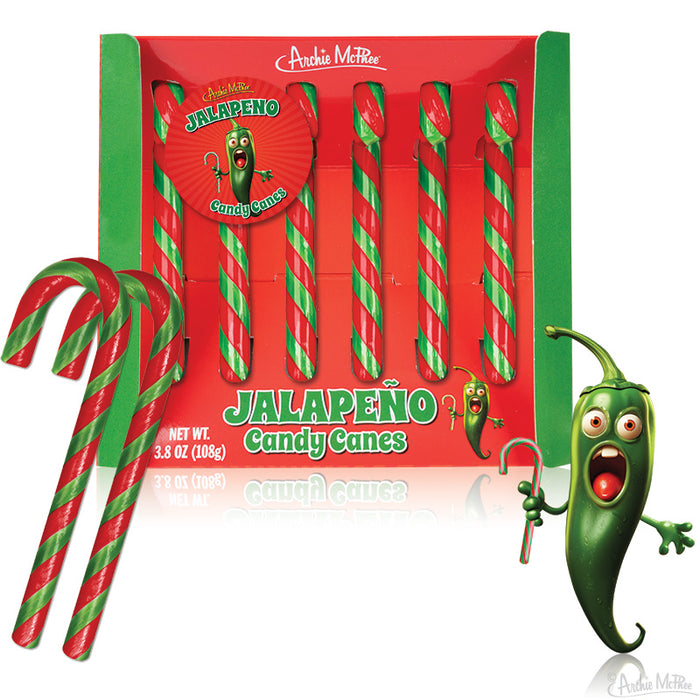 Box of Jalapeño Candy Canes featuring red and green striped candy canes, with a cartoon jalapeño character holding a candy cane. The packaging displays the product name and cartoon peppers, blending Christmas and spicy themes.