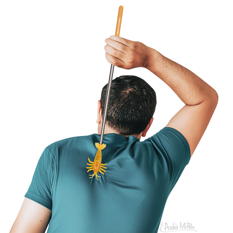 Man using a Shrimp Back Scratcher with an extended telescopic rod reaching his back itch easily