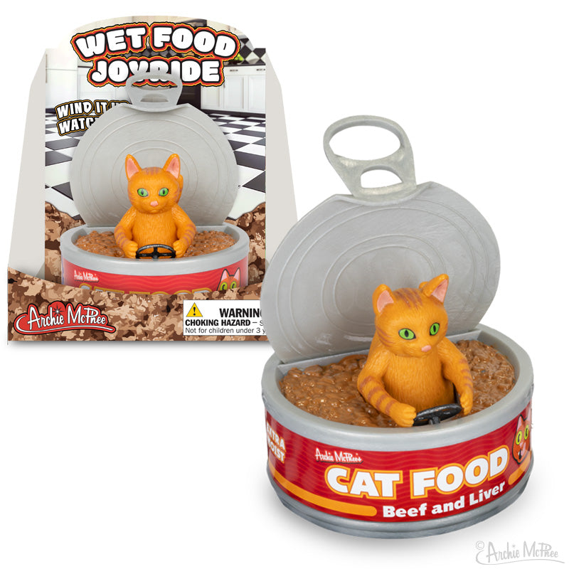 The Wet Food Joyride by Archie McPhee features a hilarious toy—a soft vinyl cat in a can of beef and liver Cat Food.