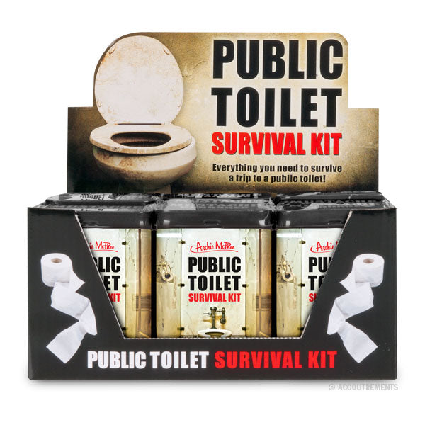 Display box of Public Toilet Survival Kits featuring multiple packages with toilet-themed graphics and text. The box showcases a toilet seat image and bold text highlighting the product name and purpose for surviving public restroom visits.