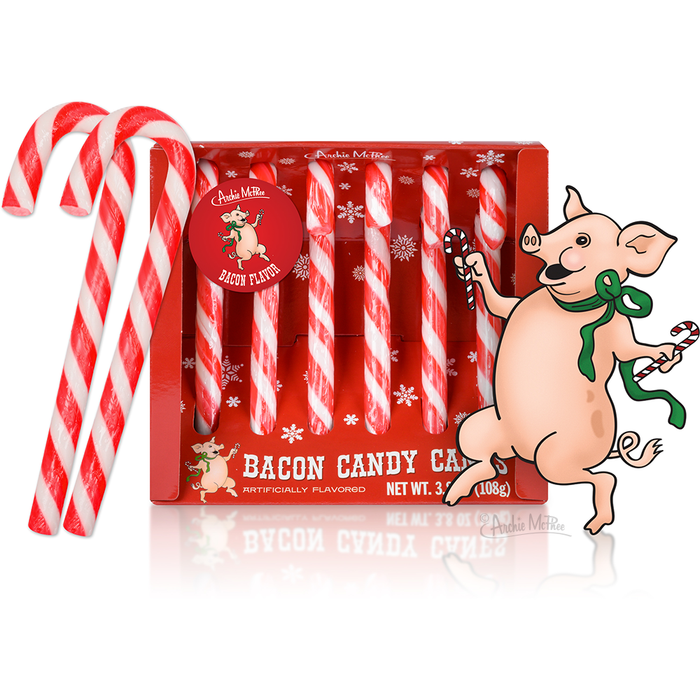 Red and white striped bacon-flavored candy canes in festive packaging with cartoon pig illustration, snowflake design, and product name "Bacon Candy Canes" visible