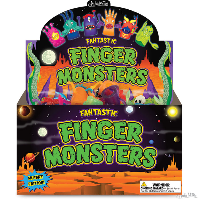 Colorful display box for Fantastic Finger Monsters, featuring vibrant cartoon monsters on a space-themed background. The box showcases various monster designs and includes product warnings.