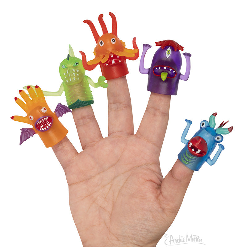 Five colorful Finger Monsters on a hand.