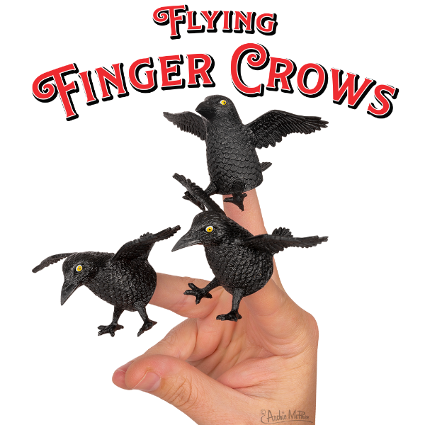 Set of three black crow finger puppets on a hand, with wings spread in flying positions, under red text reading "Flying Finger Crows