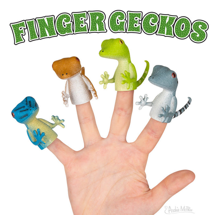 Set of four colorful gecko finger puppets in blue, green, brown, and gray displayed on a hand, with "FINGER GECKOS" text above. Soft vinyl toys for imaginative play and fun.