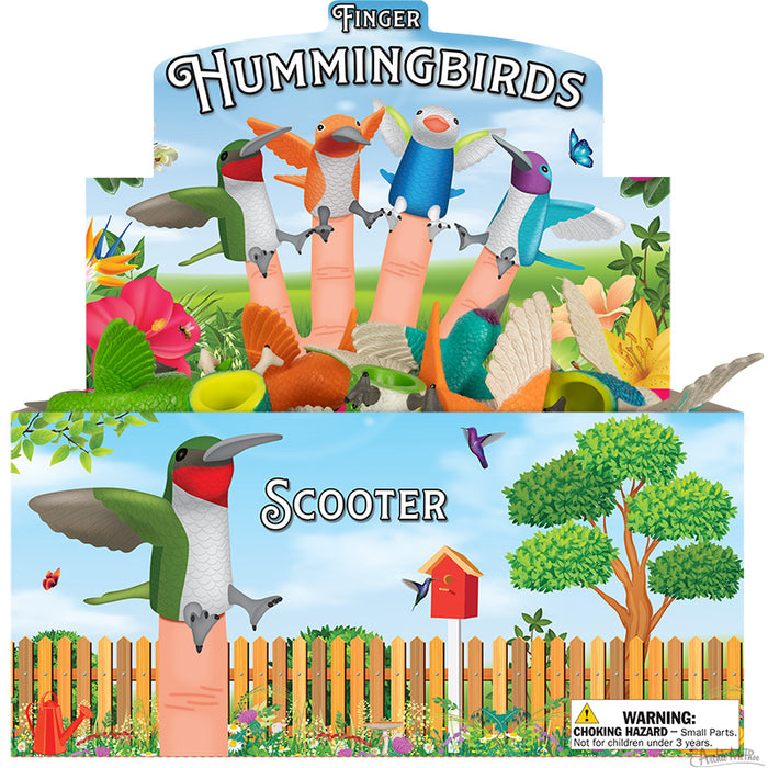 Colorful display box of finger hummingbird puppets, showcasing various designs and colors. Vibrant garden scene with flowers, trees, and a birdhouse. Product name "Finger Hummingbirds" prominently displayed with warning label for choking hazard.