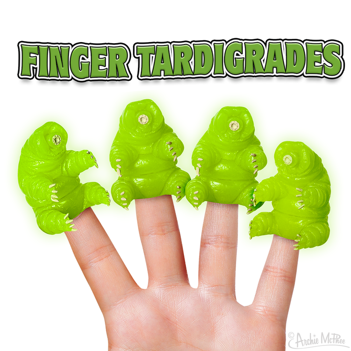 Bright green finger puppets shaped like tardigrades, placed on four fingers against a white background, with 'FINGER TARDIGRADES' text in large green letters above