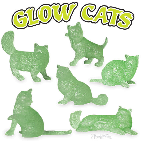 Set of six glow-in-the-dark cat figurines in various poses, made of soft green vinyl. Product title "Glow Cats" displayed in bright yellow text above the cats.