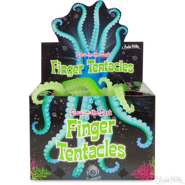 Display box of glow-in-the-dark finger tentacles, showing bright green and blue tentacle toys in a colorful packaging with underwater theme. Product name prominently displayed on box front.