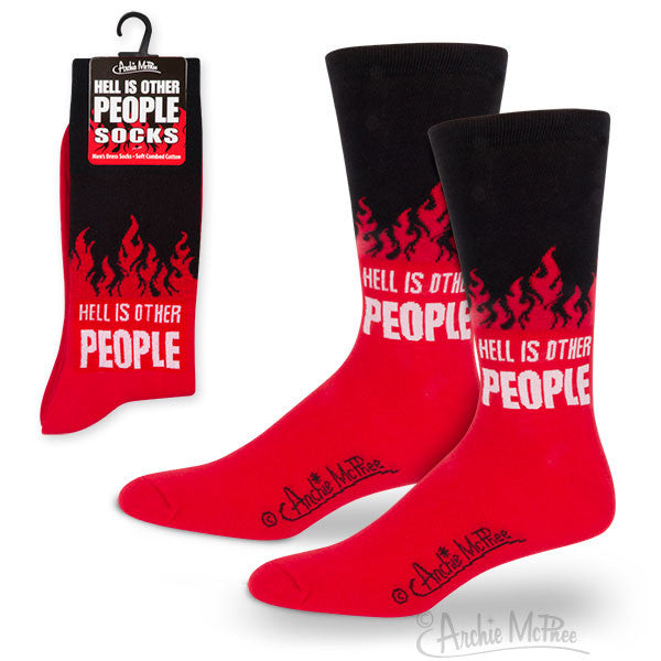 Black and red socks featuring the quote "Hell is Other People" with flame-like design. Product packaging shown alongside two displayed socks, highlighting the philosophical theme and bold color contrast.