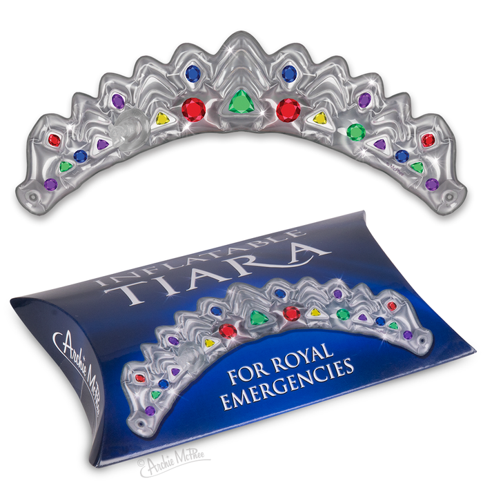 Inflatable silver tiara with colorful jewels, displayed on blue packaging labeled "Inflatable Tiara for Royal Emergencies", perfect for quick royal transformations and amusing office antics