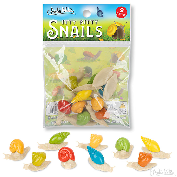 Colorful miniature snail toys in a clear bag, featuring nine assorted vinyl snails with vibrant shells in various positions. Product packaging shows "Itty Bitty Snails" title with butterfly graphic.