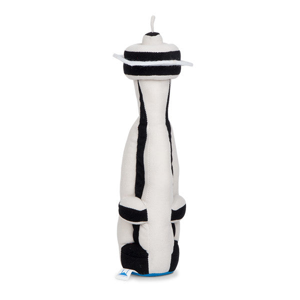 Stuffed Space Needle plush toy, white and black, featuring iconic Seattle landmark design with distinctive observation deck and spire, perfect for Seattle lovers and souvenir collectors