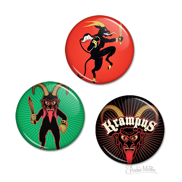 Set of three Krampus Christmas buttons featuring colorful designs: a black horned figure on red, a green-background Krampus with basket, and a black-background Krampus face with gothic text. Festive and folkloric holiday accessories.