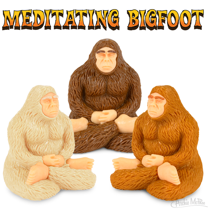 Three Meditating Bigfoot figurines in brown, tan, and white colors, sitting cross-legged with eyes closed. Text above reads "MEDITATING BIGFOOT" in bold yellow and orange letters with black outline.