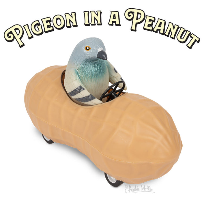 Whimsical toy featuring a blue pigeon driving a peanut-shaped car. The peanut is tan with wheels, and the pigeon is visible through the top, holding a steering wheel. Text above reads "Pigeon in a Peanut" in stylized lettering.