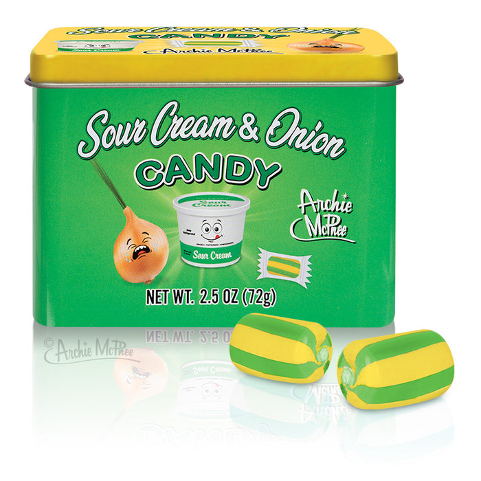 Green and yellow tin of Sour Cream & Onion Candy with cartoon onion and sour cream characters. Two striped candies in foreground. Product weight and brand name visible on tin.