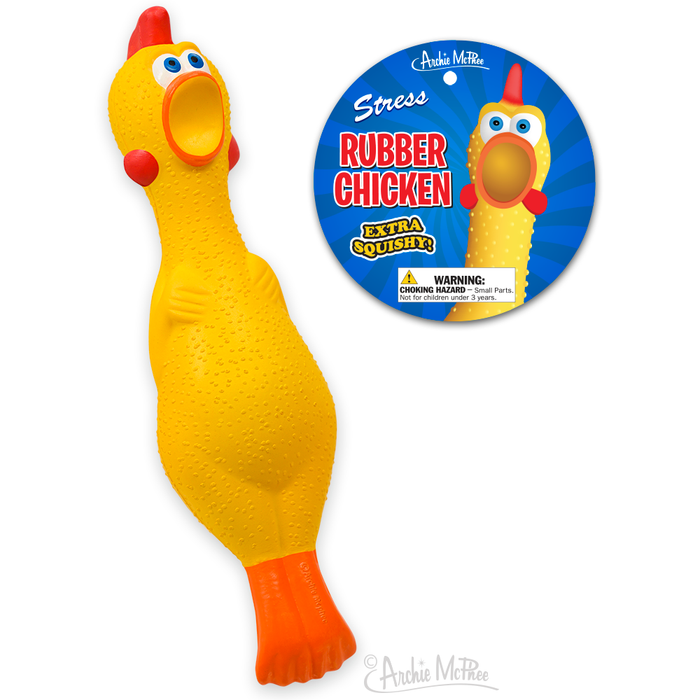 Yellow rubber chicken stress toy with comical face, red comb and feet, next to blue circular product packaging featuring "Stress Rubber Chicken" text and warning label