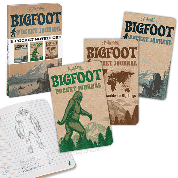 Set of three Bigfoot-themed pocket journals with kraft covers featuring different Sasquatch designs, worldwide sightings map, and mountain landscapes. Includes an open journal showing a Bigfoot sketch and handwritten notes.