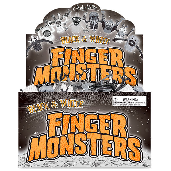 Black and White Finger Monsters display box featuring various monster characters, bold orange text, and a monochromatic theme reminiscent of classic horror movies