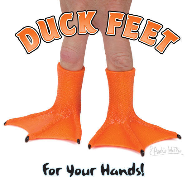 Orange duck feet finger puppets worn on two fingers, with "DUCK FEET" text above and "for your hands!" below, against white background.