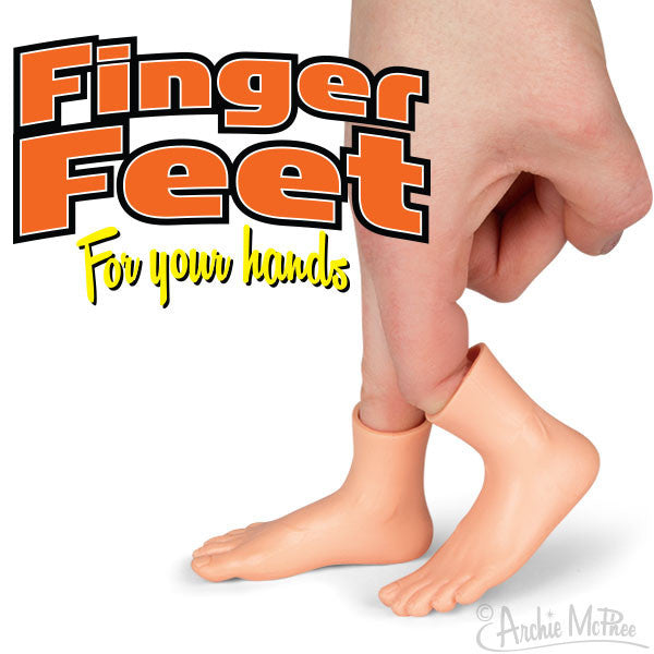 Miniature vinyl feet accessories for fingers, shown on a hand against a white background with orange "Finger Feet" logo text