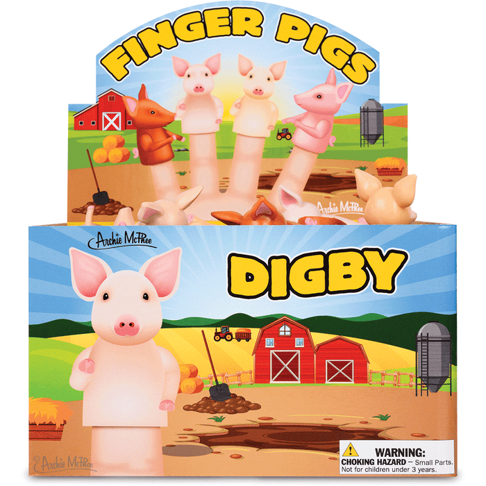 Colorful display box featuring finger pig puppets on a farm background with barn, silo, and fields. Showcases pink, orange, and brown pig puppets and a larger white pig figure. Product name "Finger Pigs" and "Digby" prominently displayed.