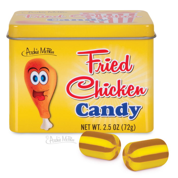 Yellow tin of Fried Chicken Candy featuring a cartoon chicken leg character, with two striped brown and yellow candies displayed below. Product name in red and blue text on bright yellow background.