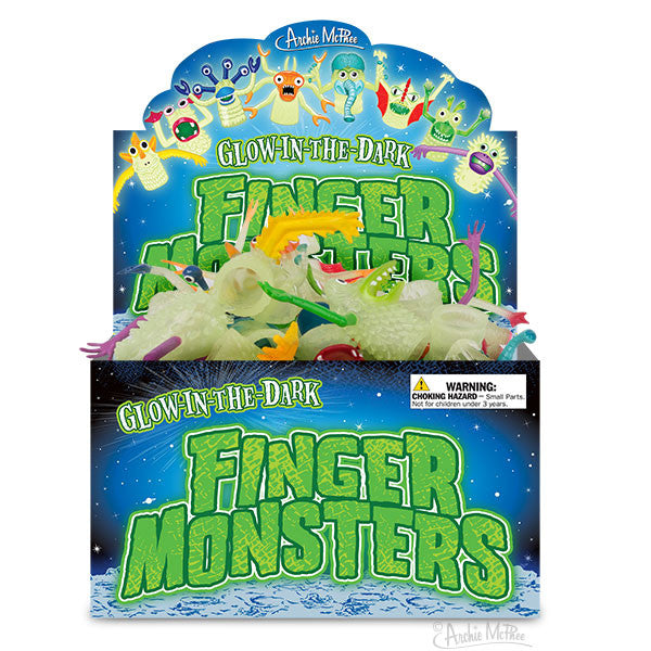 Glow-in-the-dark finger monster toys displayed in a colorful box with whimsical monster illustrations on top, showcasing various rubber monster finger puppets in different shapes and colors