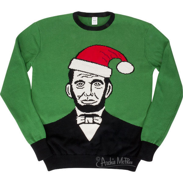 Festive green sweater featuring Abraham Lincoln wearing a Santa hat, combining presidential history with holiday cheer in a unique and quirky design perfect for ugly sweater parties