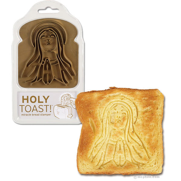 Holy Toast bread stamper with religious figure impression, alongside toasted bread slice featuring the stamped image