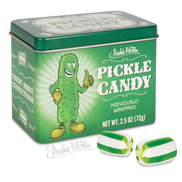 Green tin of Archie McPhee Pickle Candy featuring a smiling cartoon pickle character. The tin contains individually wrapped green and white striped hard candies resembling pickles, showcasing the unique pickle-flavored confection.