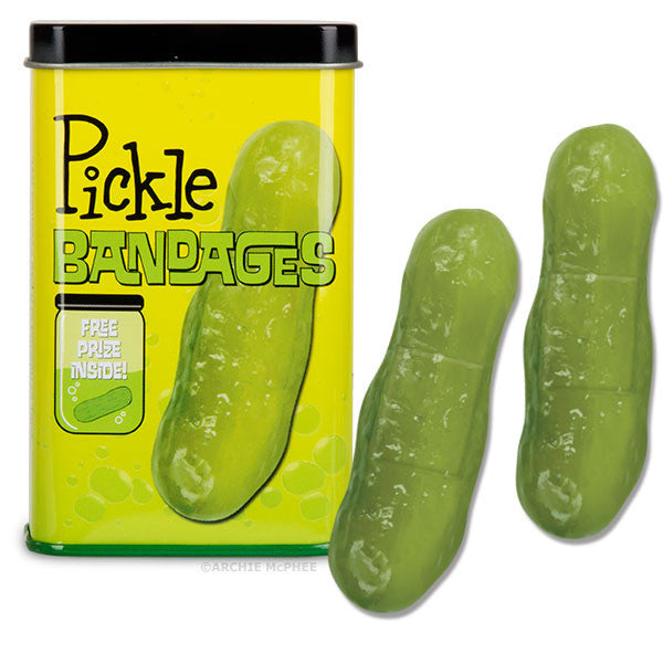 Bright yellow tin of Pickle Bandages with playful green pickle-shaped adhesive bandages, featuring fun packaging design and a free prize inside promise for quirky first aid care