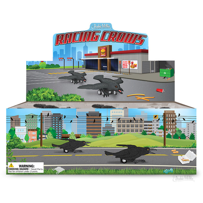 Racing Crows Bulk Box display featuring 18 wheeled crow toys in urban setting. Colorful cardboard box showcases crows on city streets and sidewalks with buildings in background. Product warning label visible.