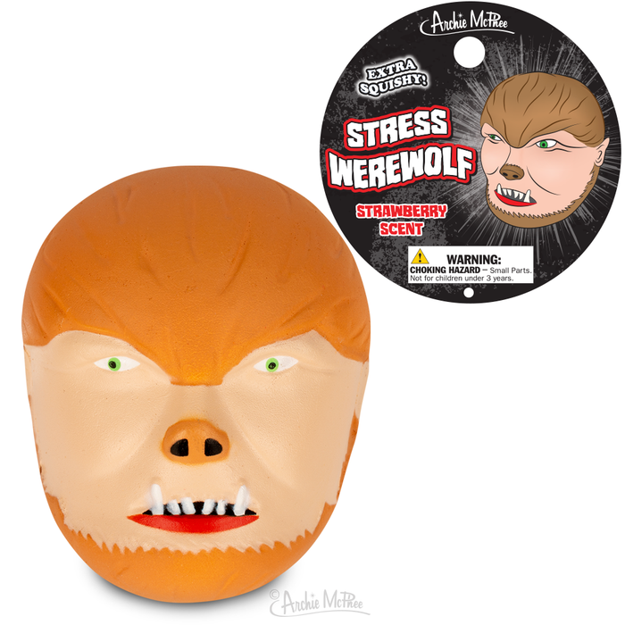 Strawberry-scented Stress Werewolf foam toy with fierce facial features, orange fur, and green eyes, alongside product packaging showing werewolf transformation and warning label