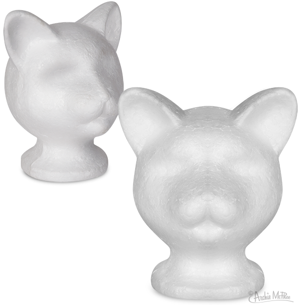 Styrofoam cat head mannequins, white in color, featuring pointed ears and smooth surfaces. Ideal for displaying cat accessories or as decorative items. Two heads shown, one facing forward and one at an angle.