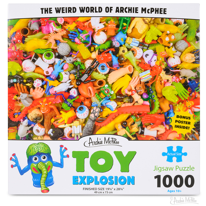 Colorful jigsaw puzzle box featuring a chaotic array of toys, titled "Toy Explosion" by Archie McPhee, with 1000 pieces and a finished size of 19" x 28". Includes a bonus poster and showcases a vibrant mix of quirky, playful objects.