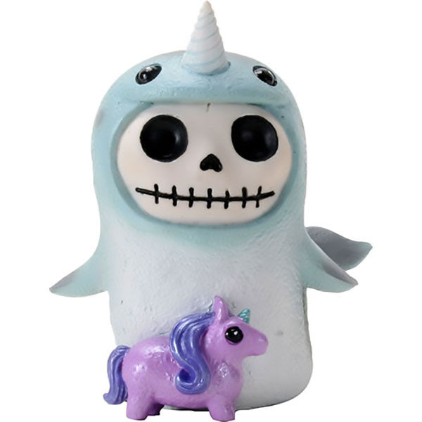 Furrybones Whally Narwhal figurine featuring a smiling skeleton in a light blue narwhal costume with a spiral horn, holding a small purple unicorn toy, set against a white background